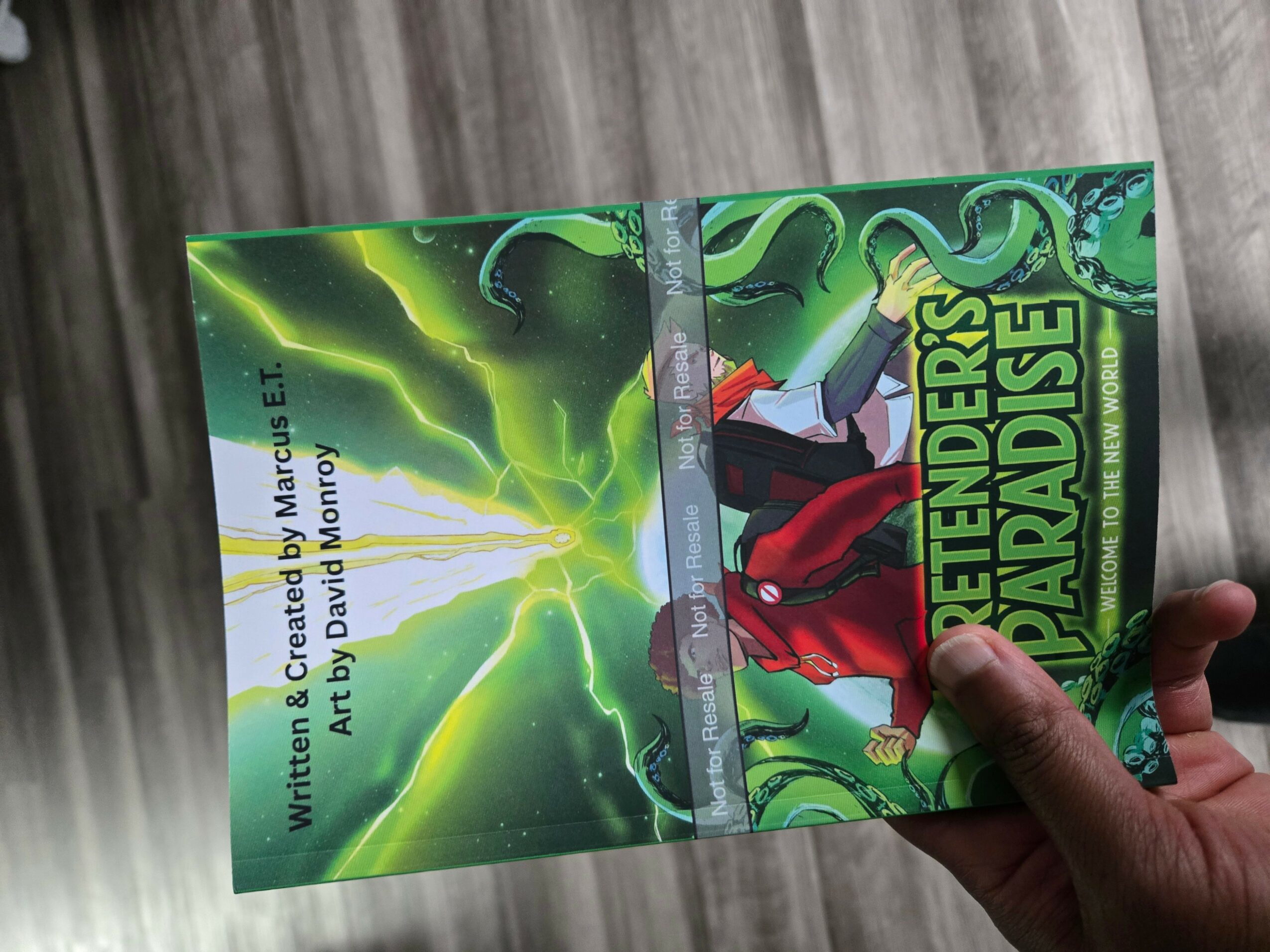 Person holding a comic book titled 'Teen Titans Go! Pandora's Box' with a green lightning background.
