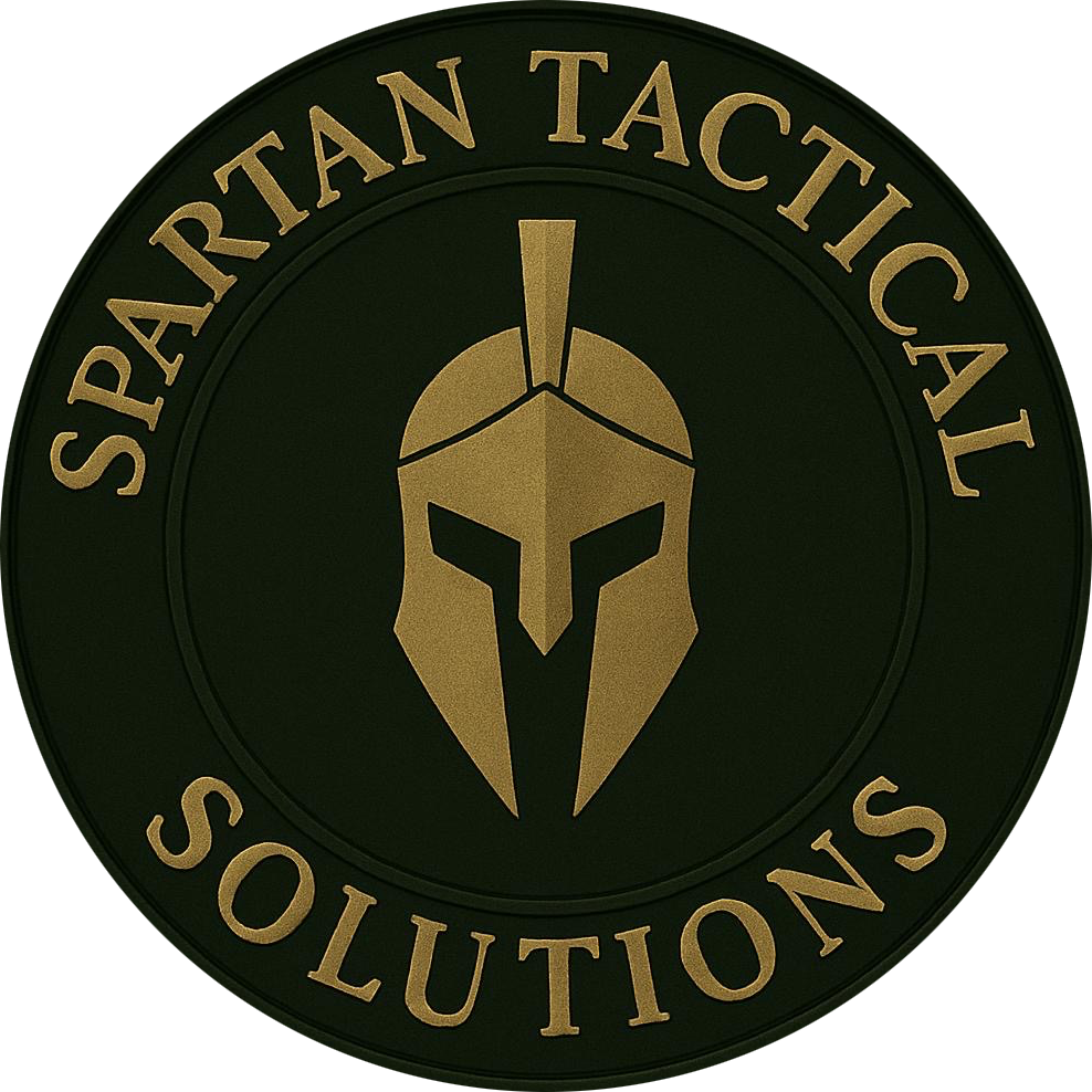 Logo with a helmeted Spartan face and text 'Spartan Tactical Solutions' in gold on a dark background.