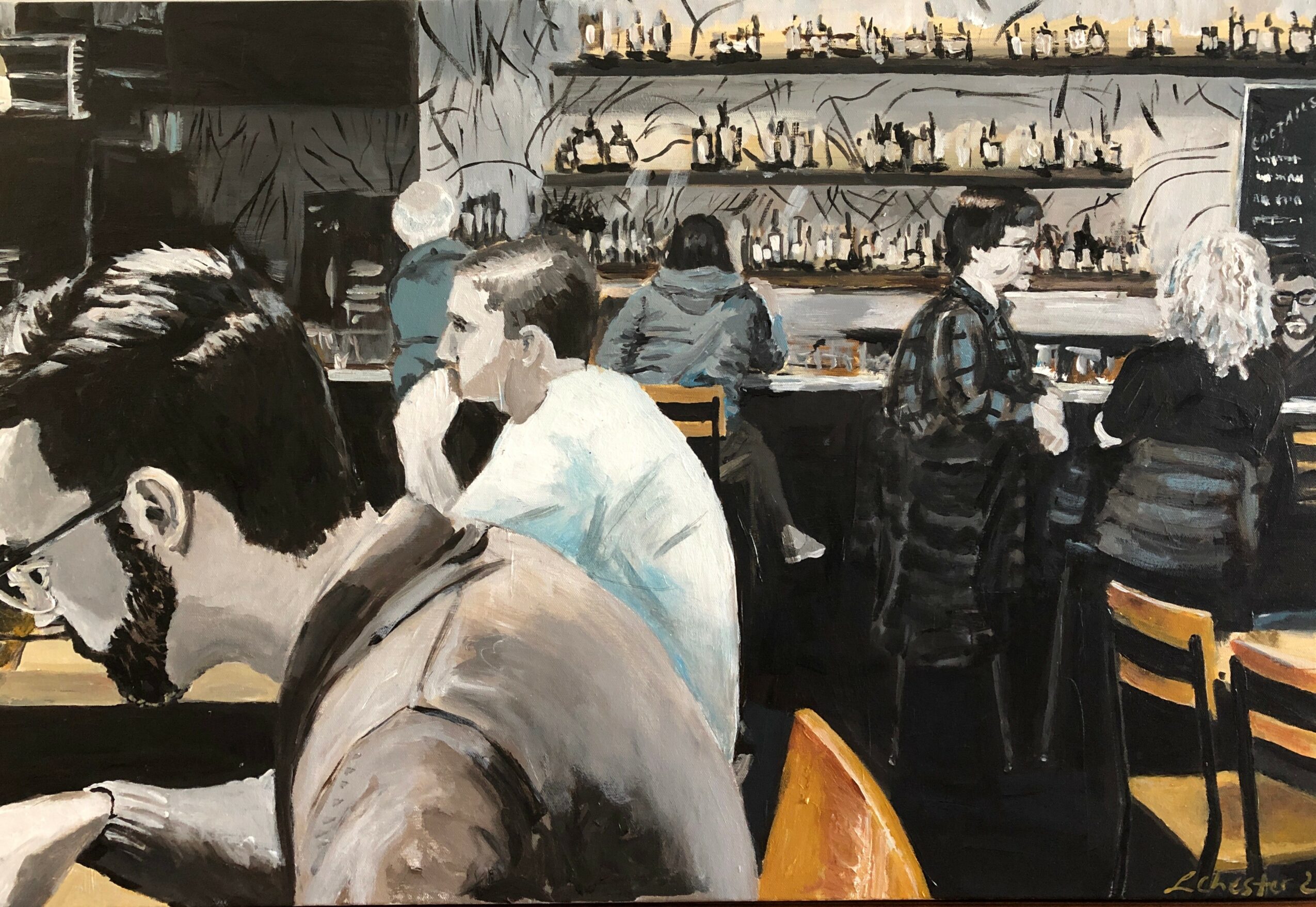 People sitting at a bar or cafe, some reading or talking, shelves with bottles in the background.