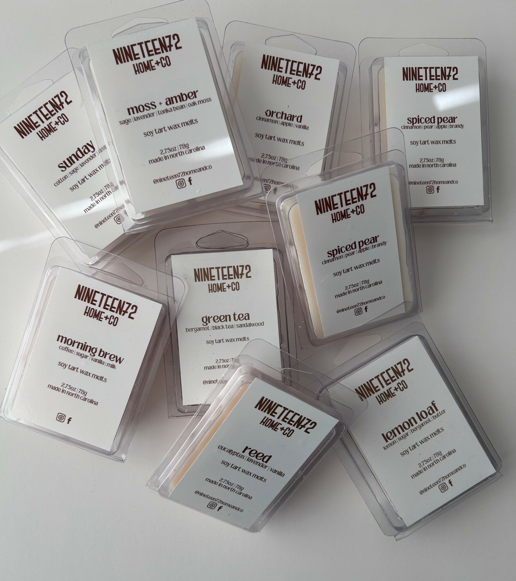 Collection of nine clear plastic cards with text, arranged in a scattered pattern on a white surface.
