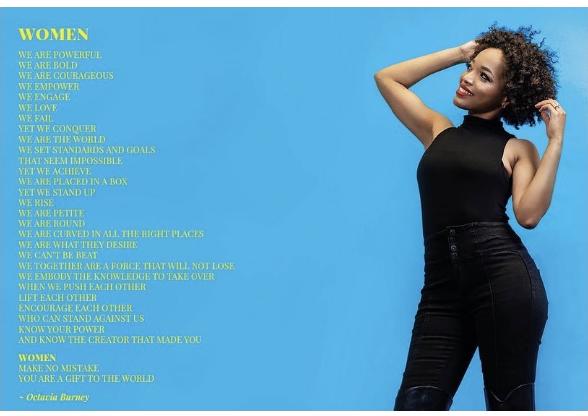 Woman with curly hair in a black sleeveless top and pants, smiling with hand on head, blue background, text on left.