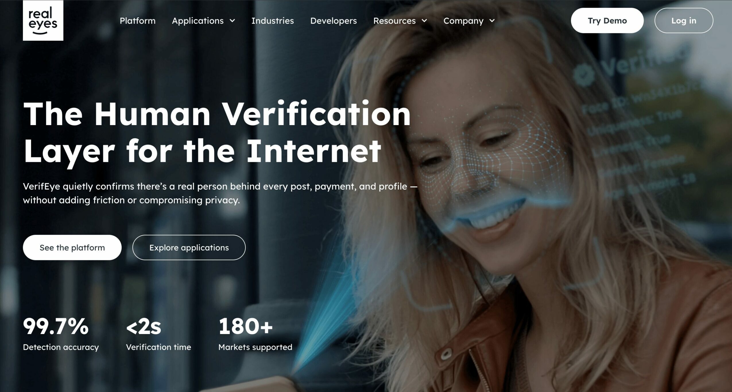 Smiling woman with long hair looking down, website overlay with text about human verification layer, and statistics.