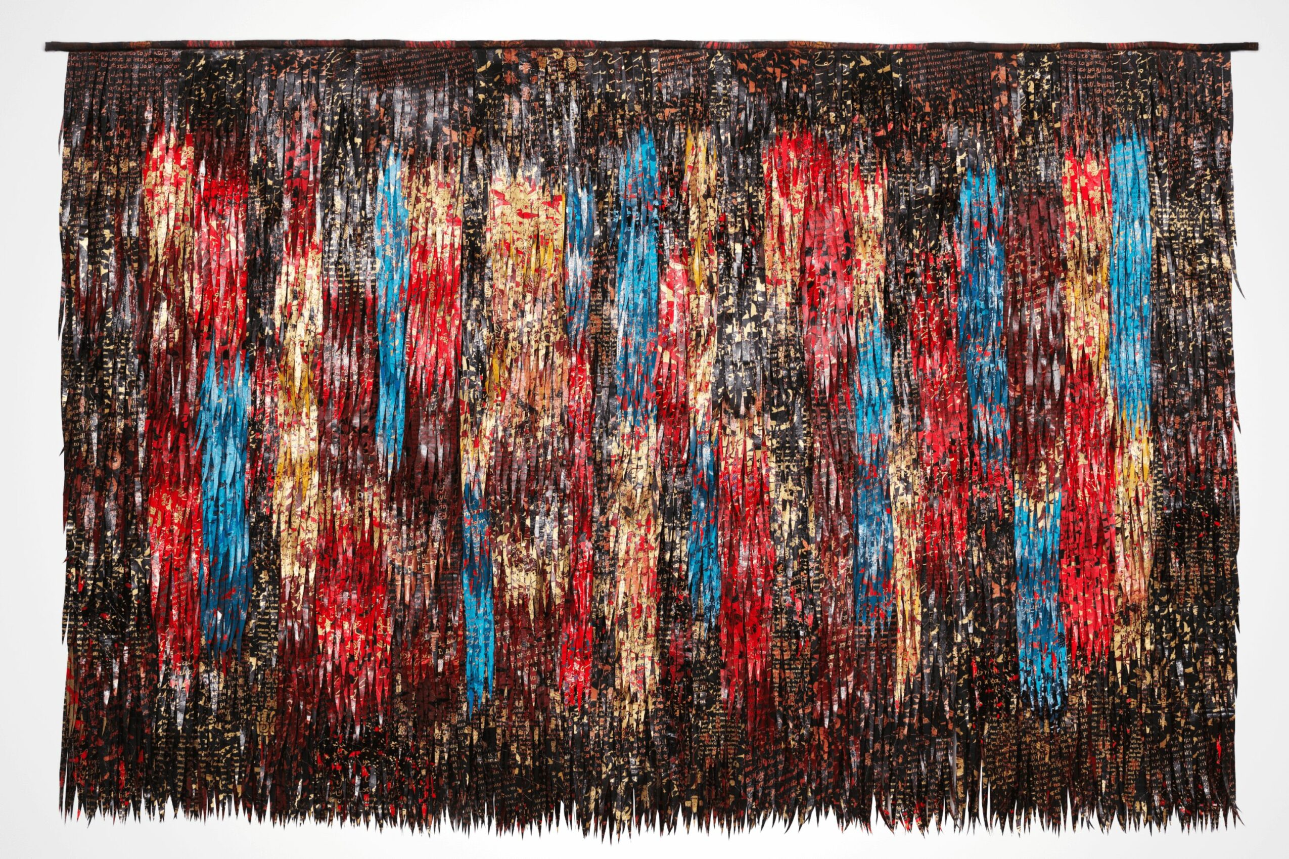 Abstract colorful painting with vertical streaks of red, blue, yellow, and black on a dark background.