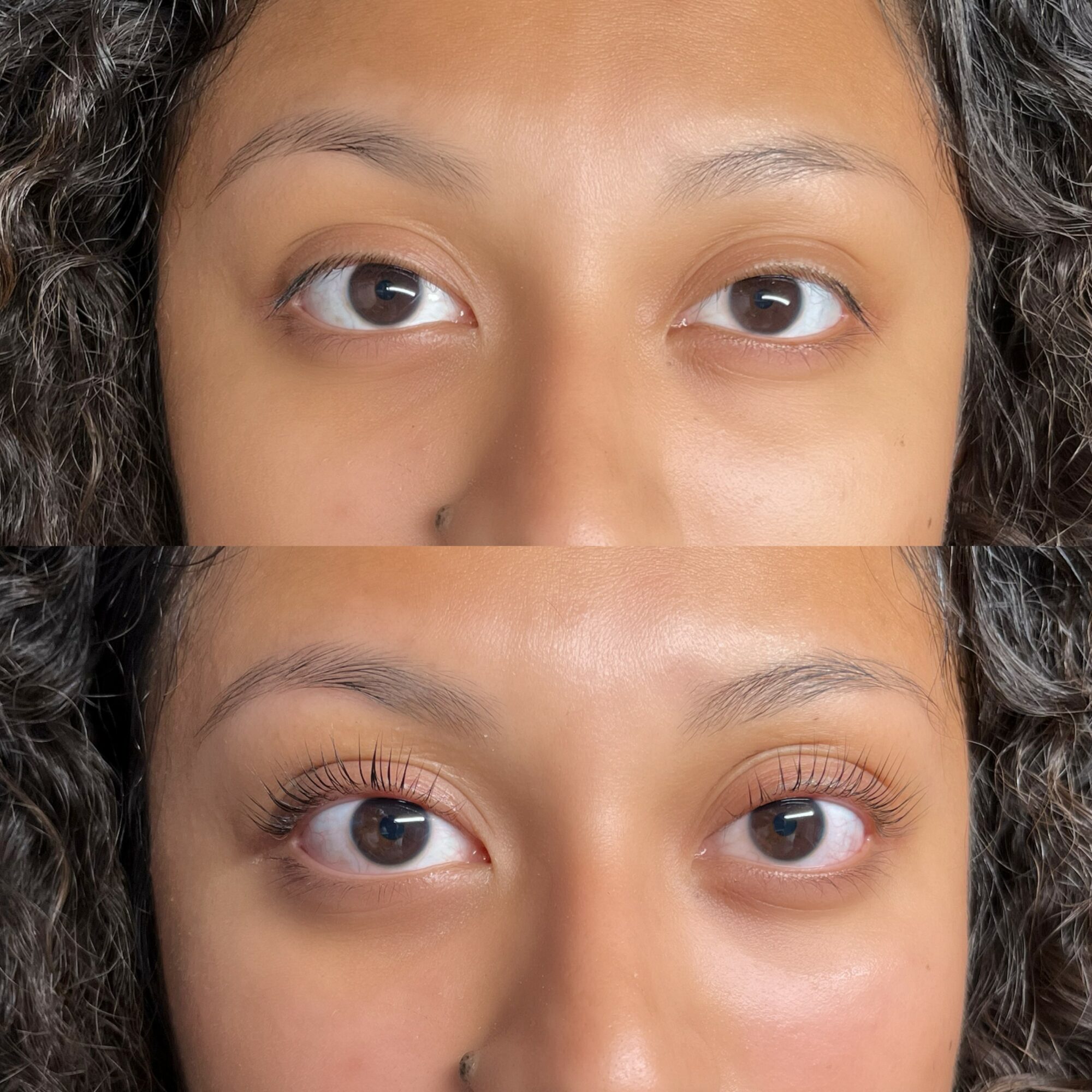Two faces, one above the other, with similar skin tones and curly hair, looking directly at the camera.
