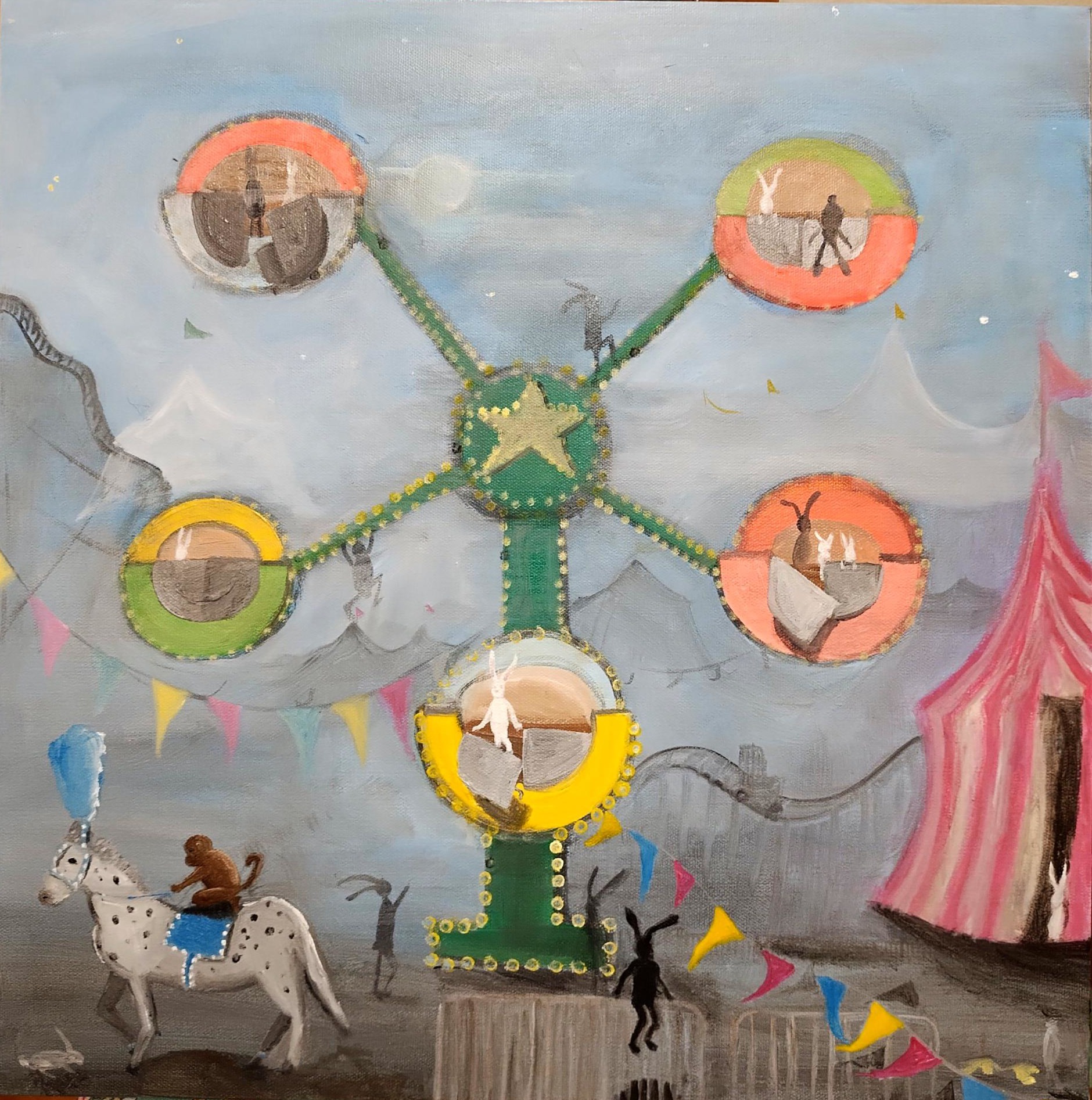 A colorful carnival ride with a star at the center and five circular seats, each with a person, against a cloudy sky.