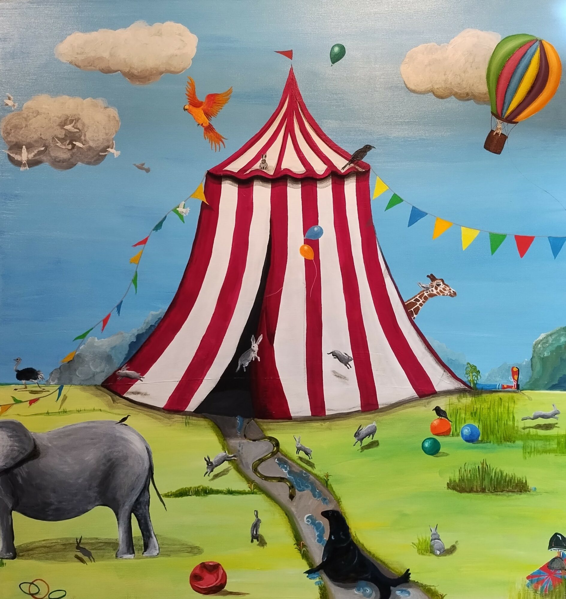 Colorful circus tent with animals, balloons, and clouds in a bright outdoor scene.