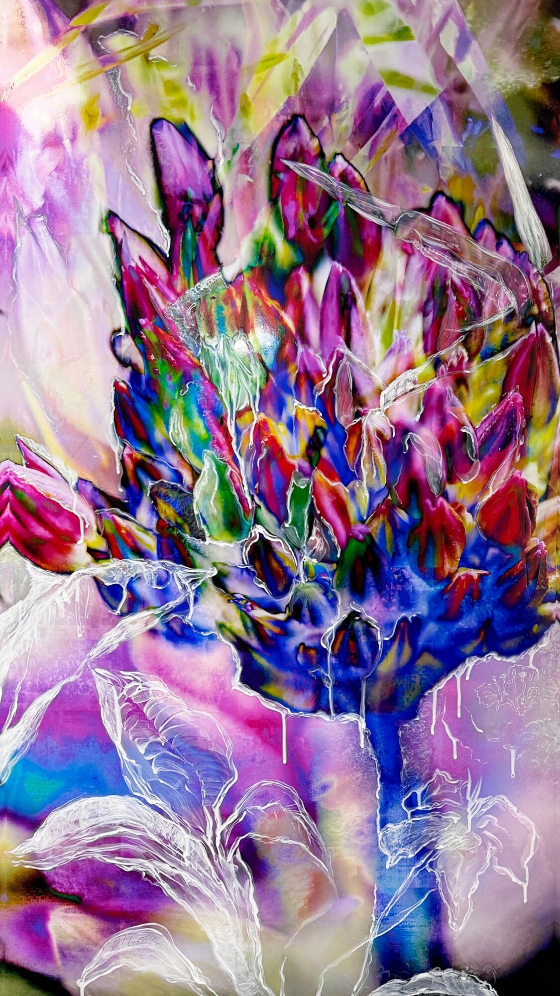Abstract colorful floral design with vibrant pink, purple, blue, and green hues, resembling a bouquet of flowers.