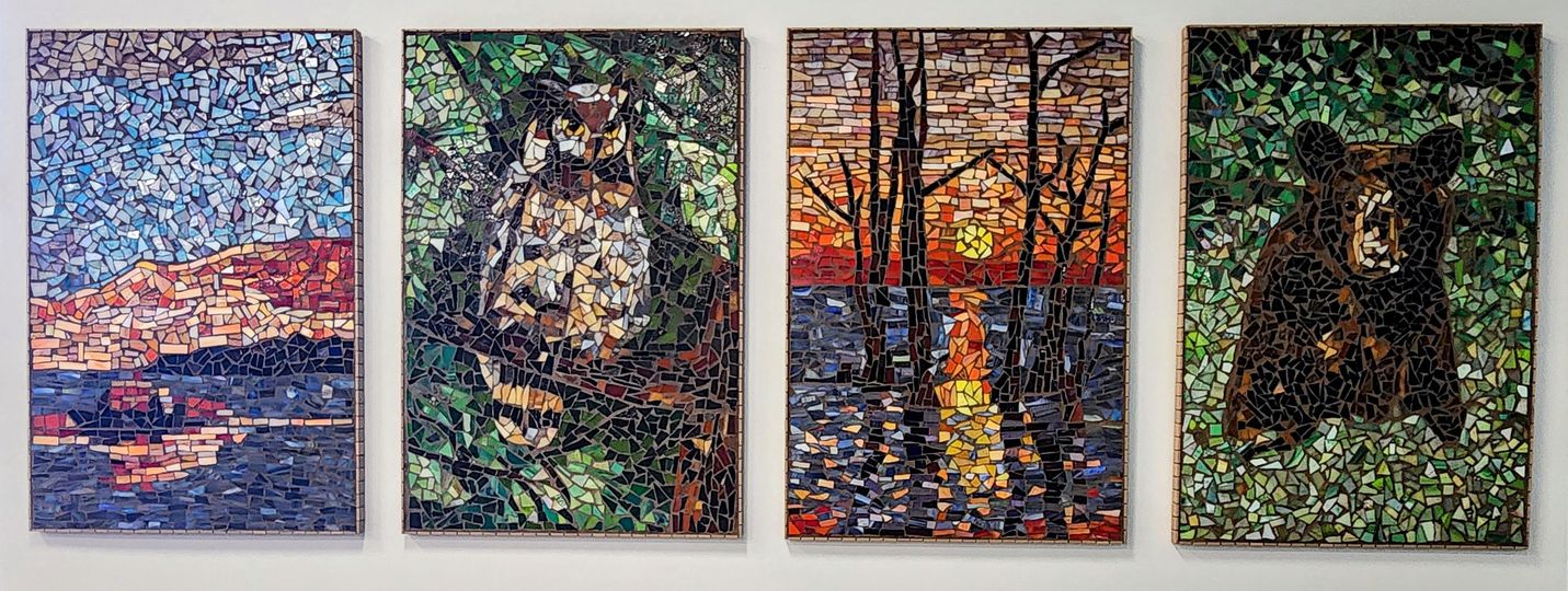 Four mosaic-style paintings of landscapes and animals, including a river, a bear, a sunset over water, and a bear in a forest.