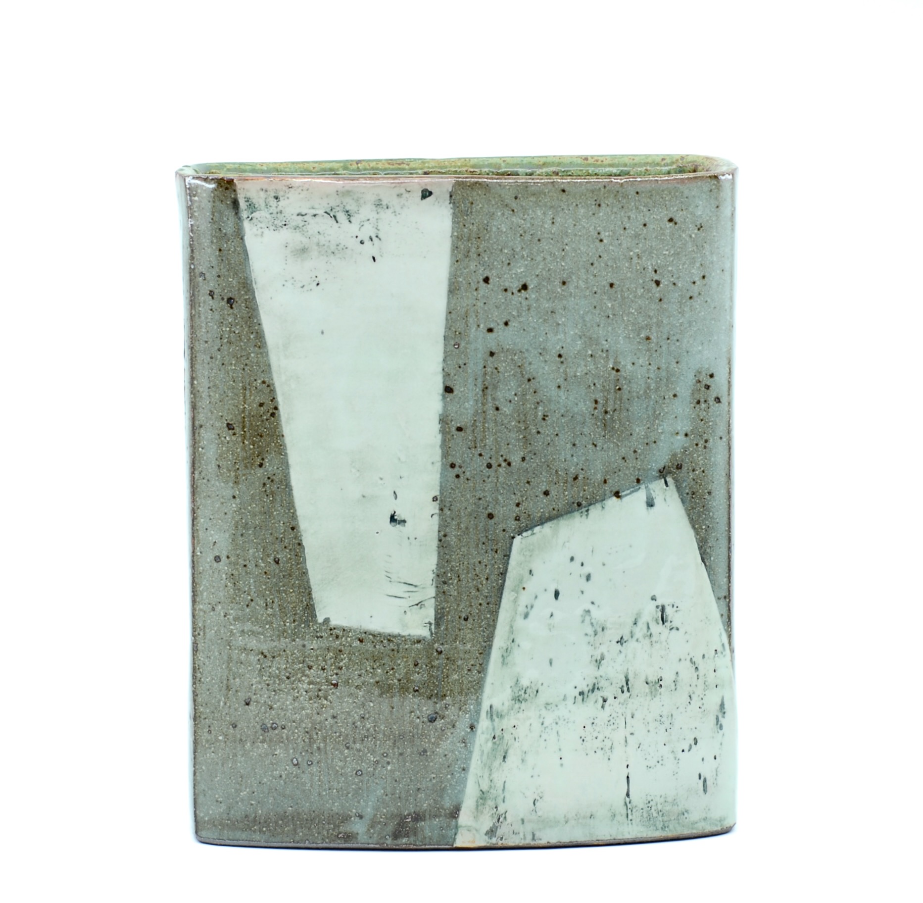 Square ceramic vase with abstract white and gray geometric patterns, textured surface, and uneven edges.