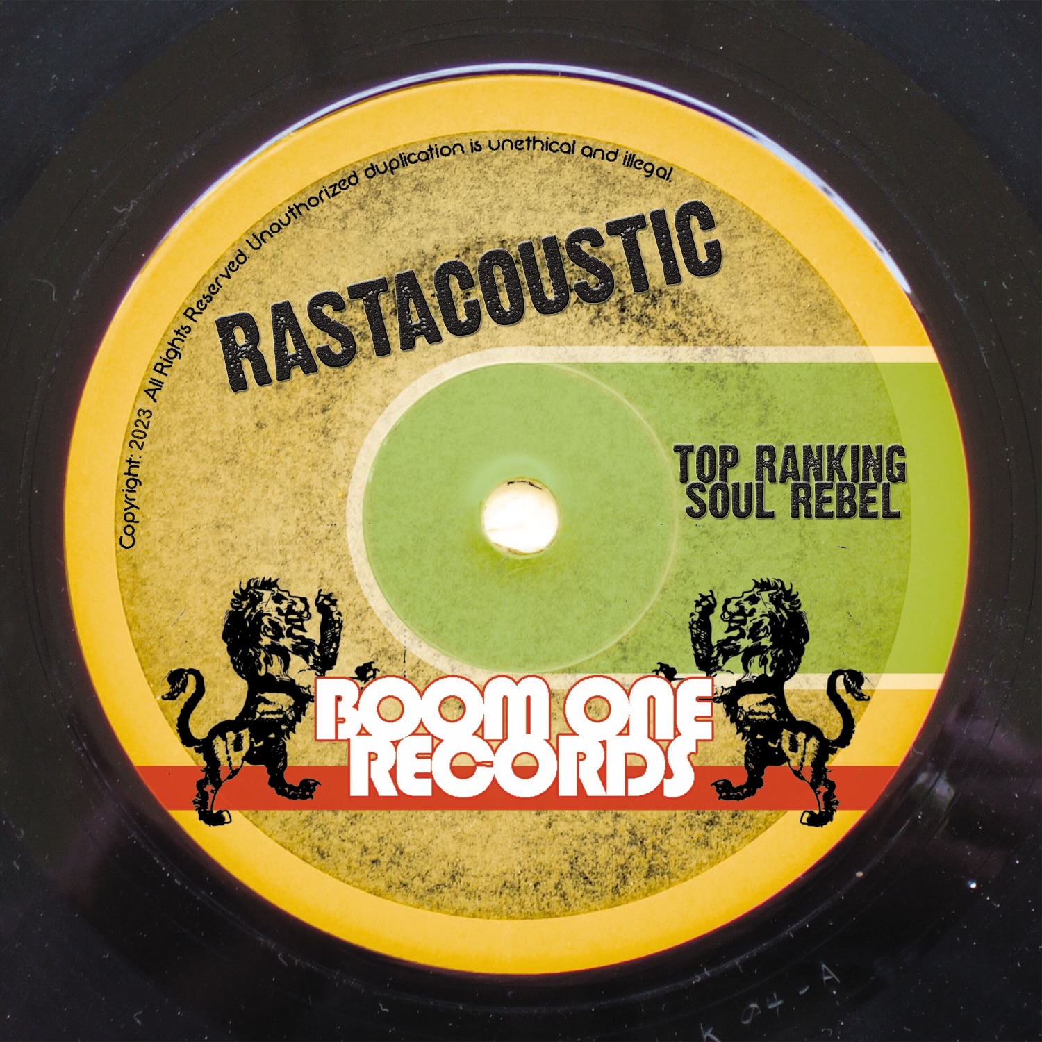 Record label with yellow, green, and red colors, featuring the text 'RASTACOUSTIC' and 'TOP RANKING SOUL REBEL', with two lion illustrations.