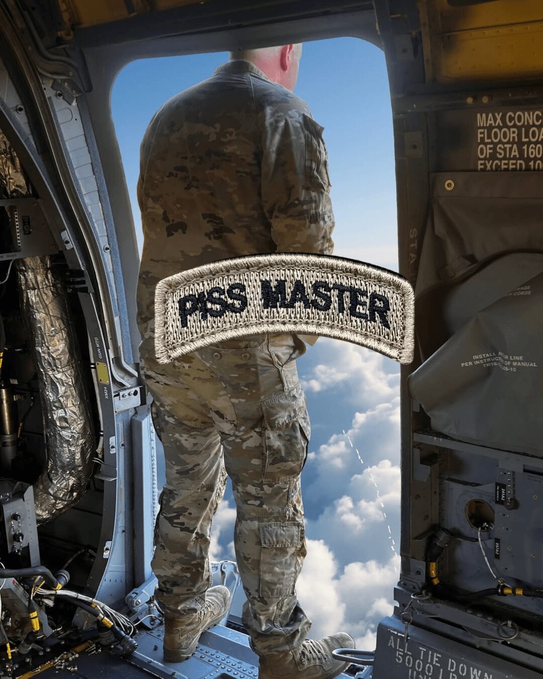 Person in camouflage uniform standing at aircraft door, sky and clouds visible outside, patch reading 'PSS MASTER' in foreground.