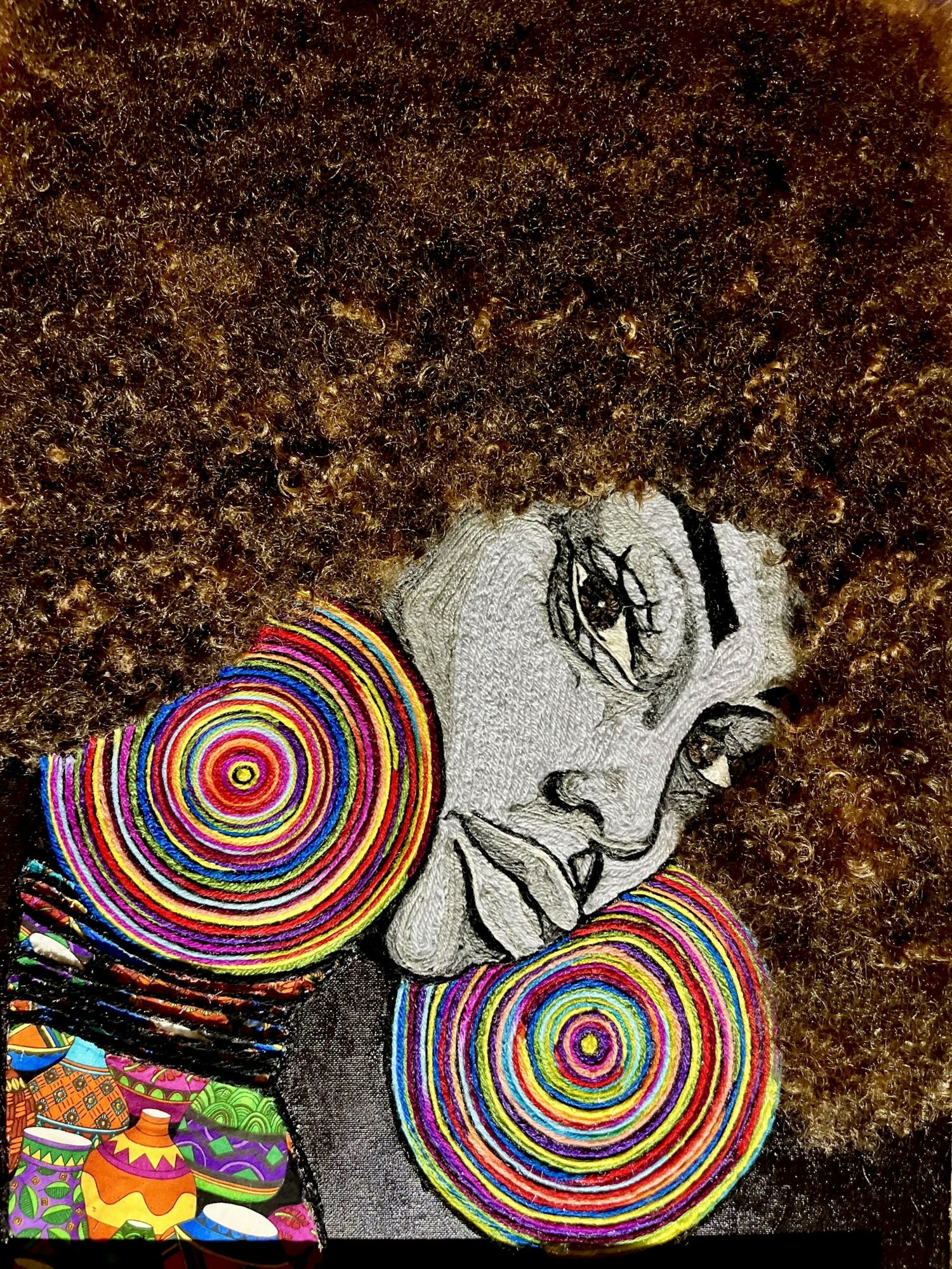 Black and white drawing of a woman's face with large, colorful spiral earrings, on a textured brown background.