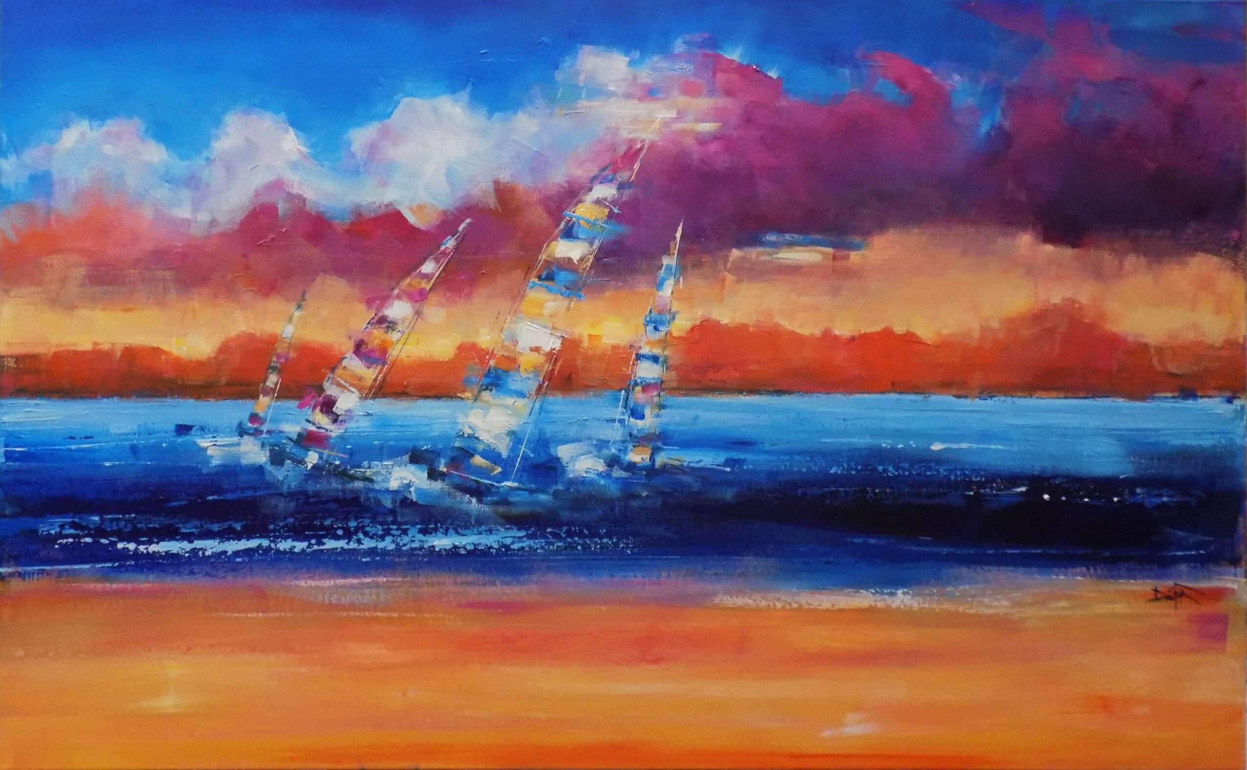 Colorful sunset over water with sailboats, vibrant sky with clouds, and a sandy foreground.