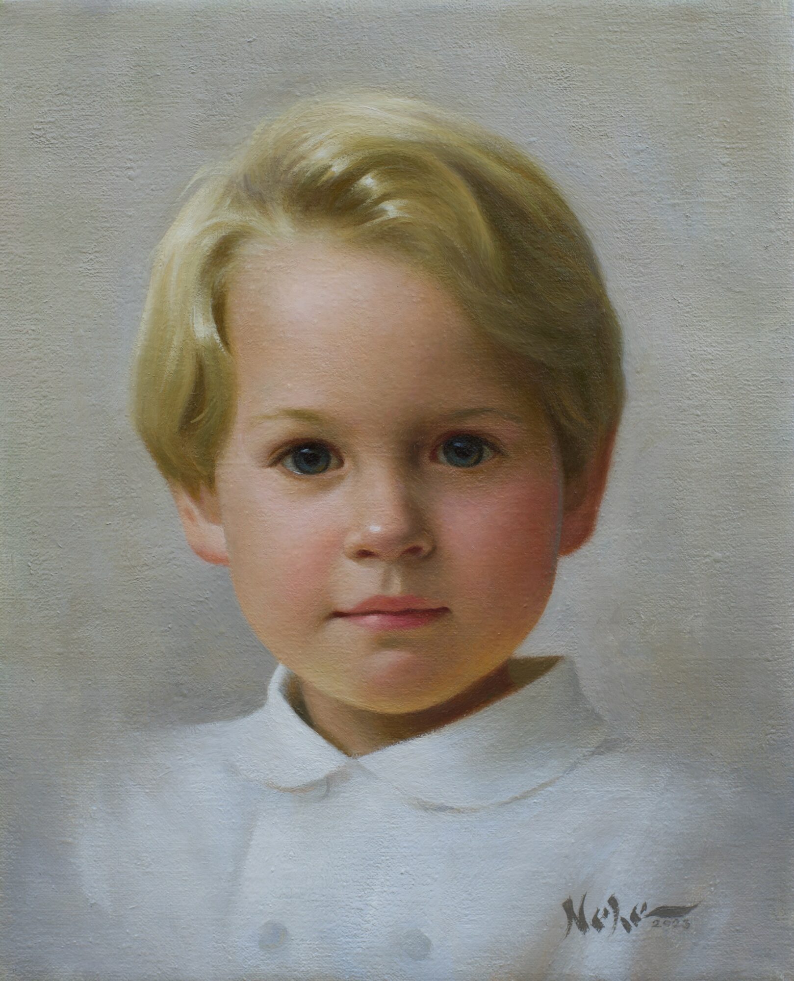 Child with blonde hair and a white shirt, facing forward, neutral expression.